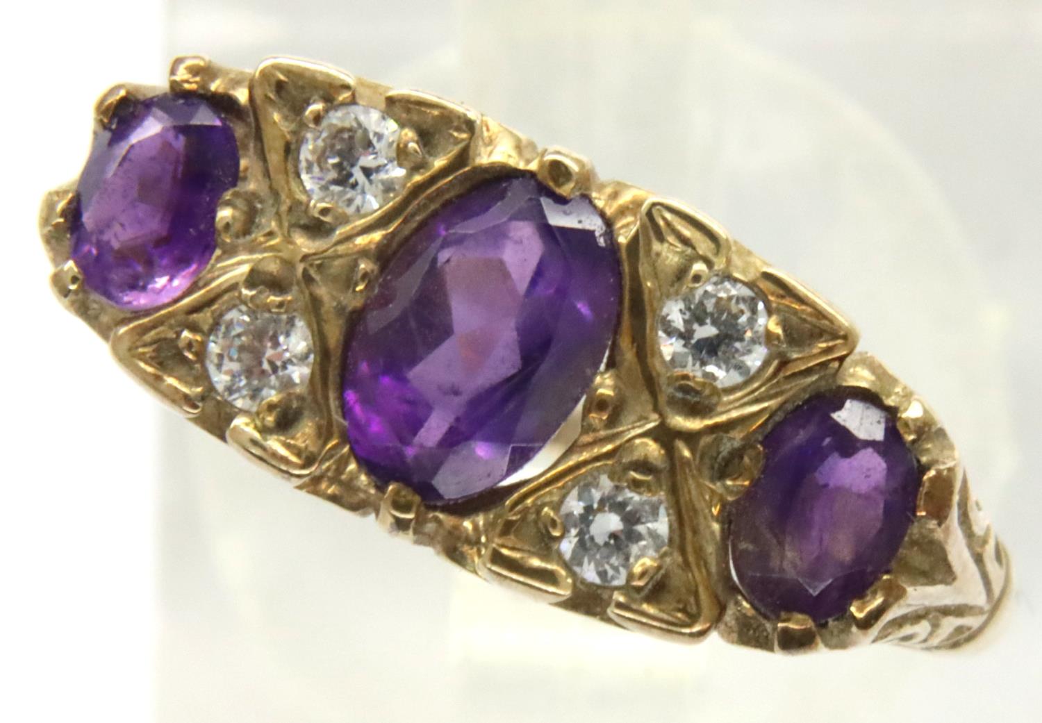 9ct gold amethyst and white stone set ring, size M/N, 2.4g. P&P Group 1 (£14+VAT for the first lot