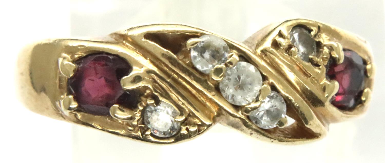 9ct gold ruby and white stone set ring, size P/Q, 2.7g. P&P Group 1 (£14+VAT for the first lot