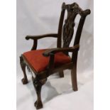 Carved mahogany framed childs or apprentice chair in the Heppelwhite manner with drop in upholstered