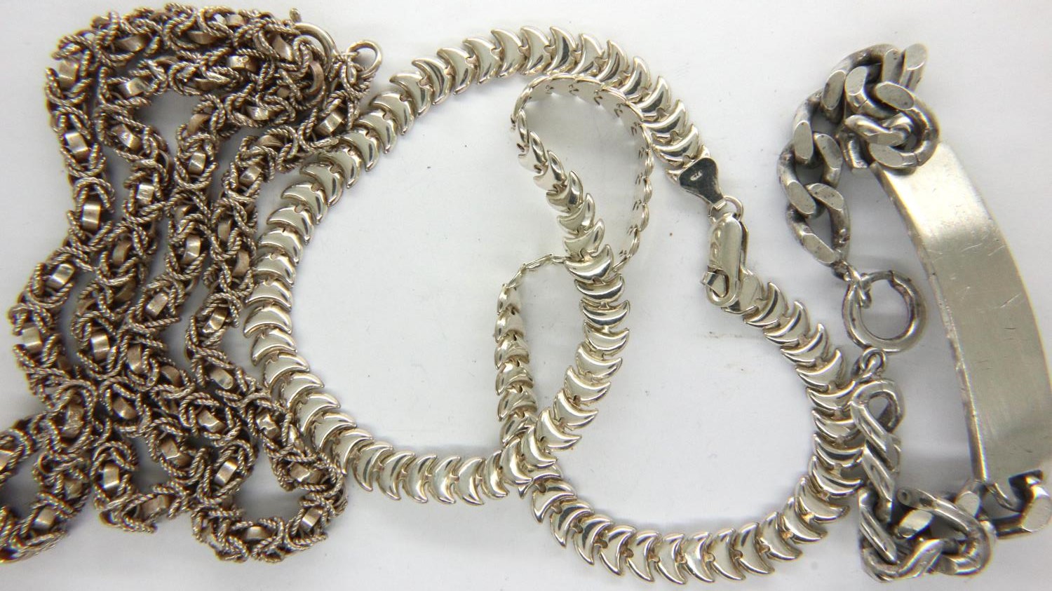 Two 925 silver neck chains and a silver ID bracelet, not inscribed, combined 81g. P&P Group 1 (£14+