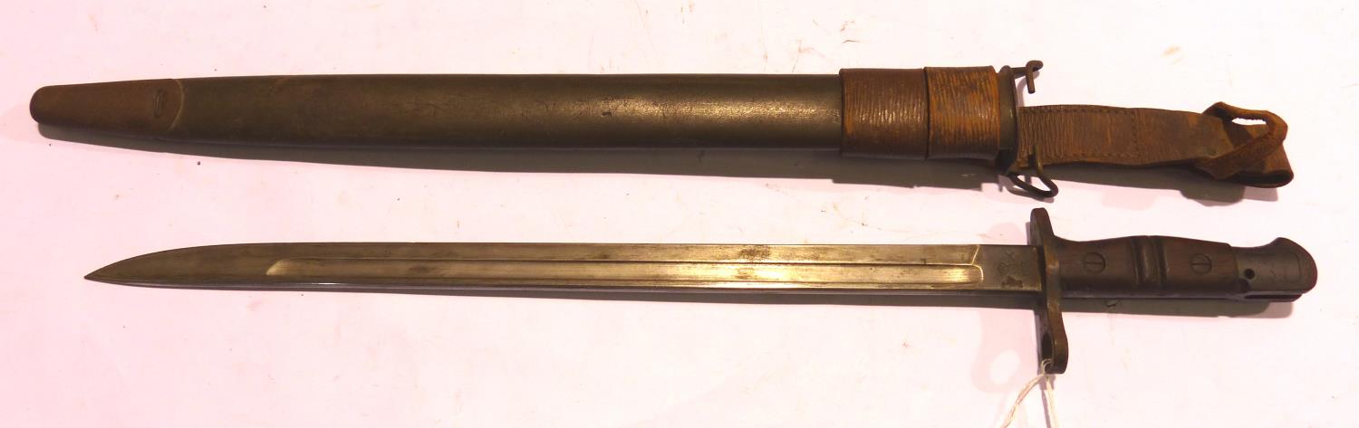 American WWII Remington bayonet with scabbard and leather frog. P&P Group 3 (£25+VAT for the first