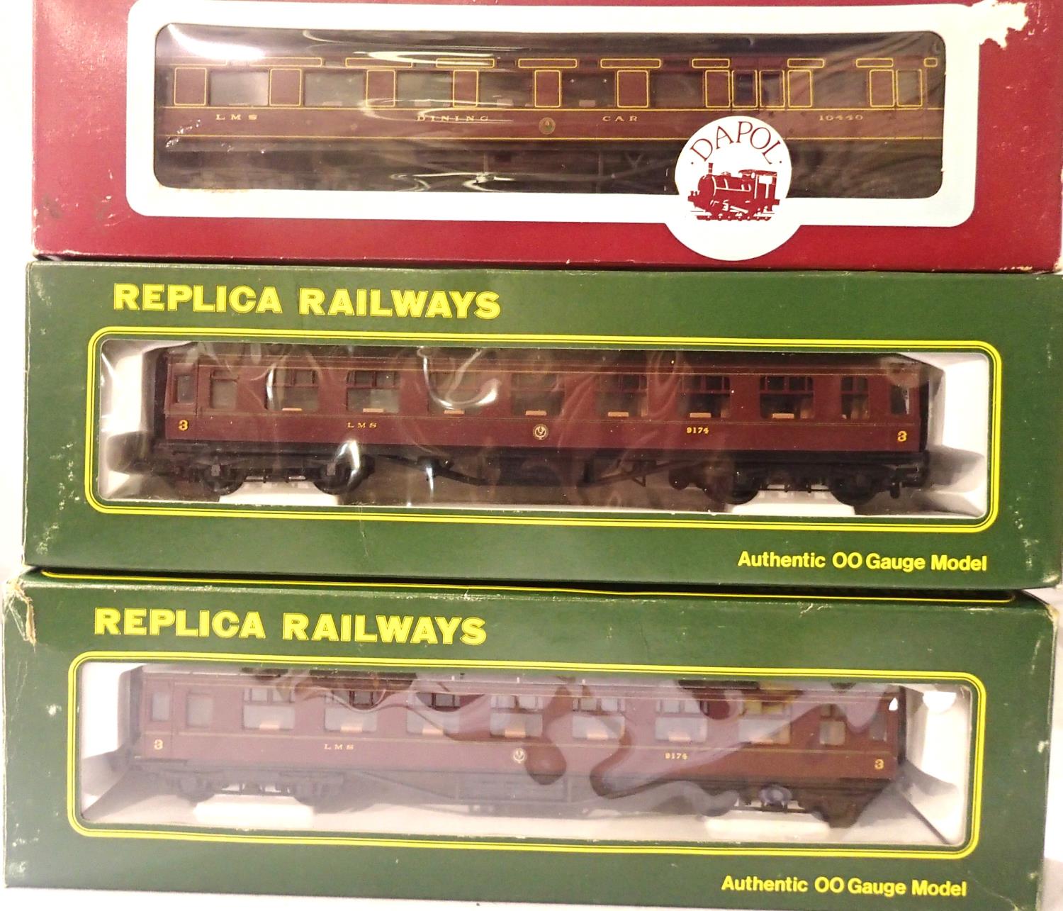 Dapol 12 wheel LMS dining car and two replica LMS Vestibule 2rd coaches, in excellent condition,