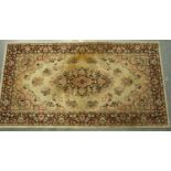 A Kashmir woollen rug, 150 x 80 cm. Not available for in-house P&P, contact Paul O'Hea at