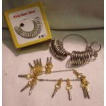 Set of fourteen antique style pocket watch keys and a boxed set of finger ring sizers. P&P Group