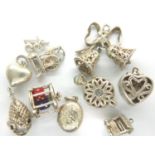 Ten 925 silver charms, to include a locket and a fish, combined 33g. P&P Group 1 (£14+VAT for the