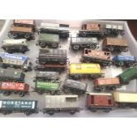Twenty six assorted OO scale wagons, various makes and types, mostly good condition and unboxed. P&P