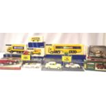Selection of twelve boxed diecast vehicles, various makes and types. Mostly very good condition,