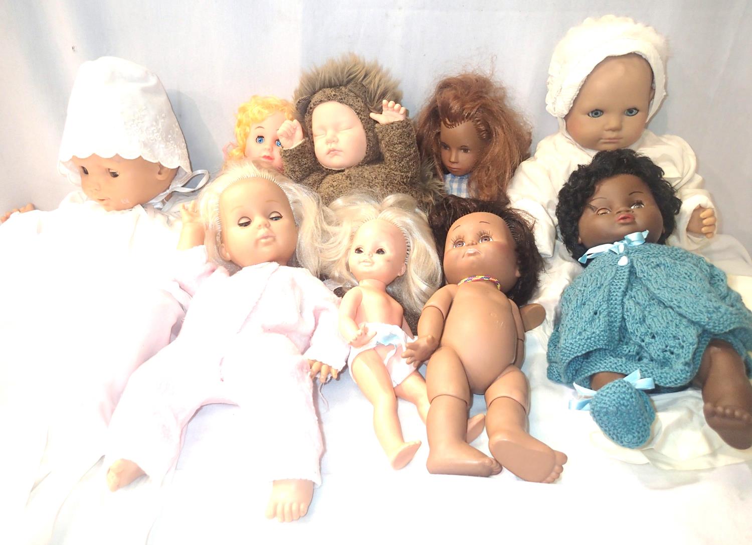 Nine assorted vintage dolls, including baby examples with various makes. P&P Group 1 (£14+VAT for