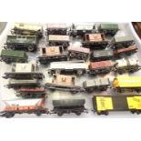 Twenty five assorted OO scale wagons, various makes and types, mostly good condition and unboxed.