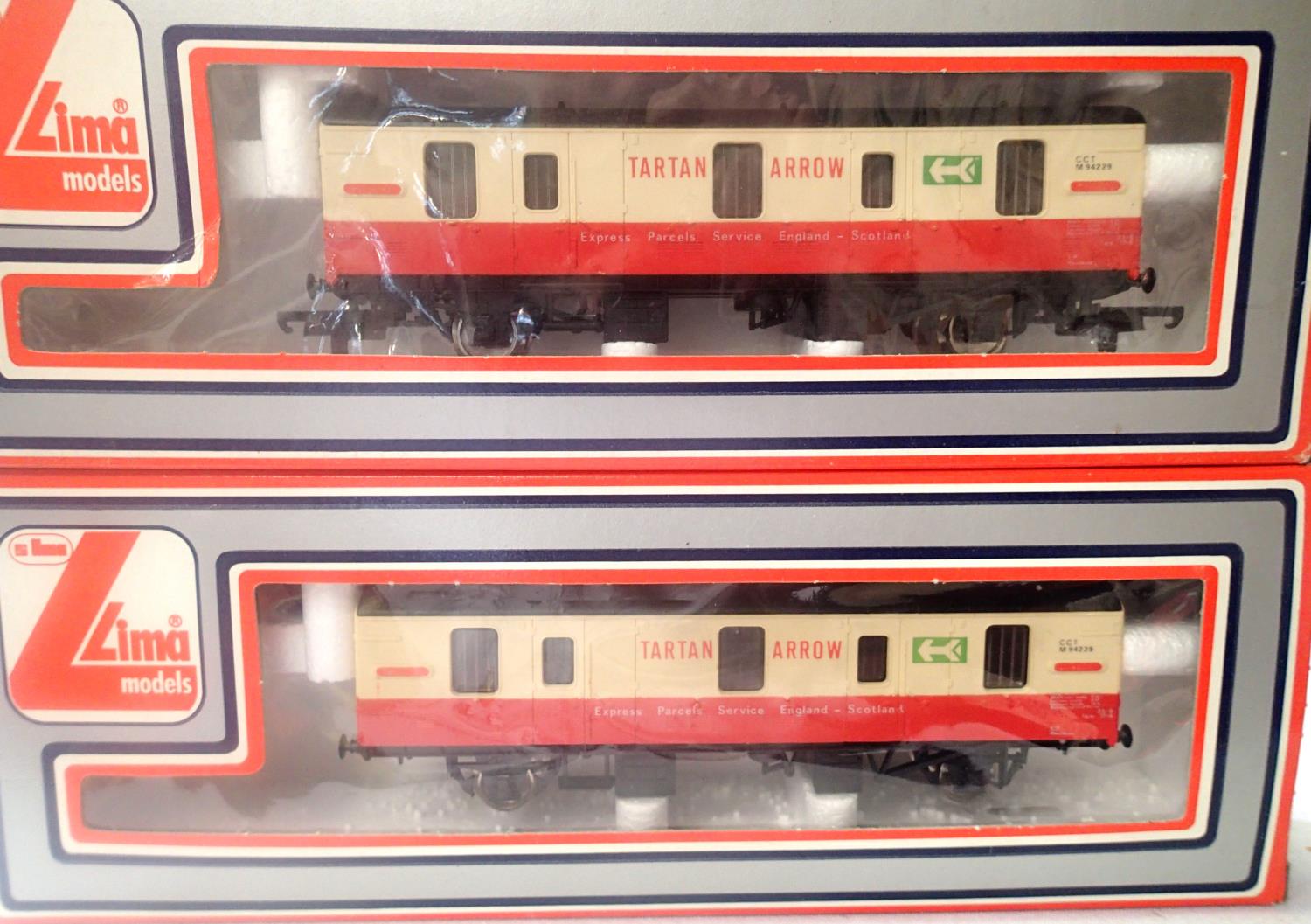 Two Lima Tartan Arrow Express Parcels vans, very good condition, boxes with wear. P&P Group 1 (£14+
