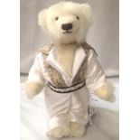Deans bear Elvis with certificate, excellent condition, H: 28 cm. P&P Group 1 (£14+VAT for the first