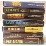 Seven Sega Mega Drive games, with booklets. Three are missing booklets ;Aladdin, Rolo and