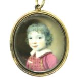 Very well painted miniature pendant set in gold of a child, H: 40 mm, 12.2g. P&P Group 1 (£14+VAT