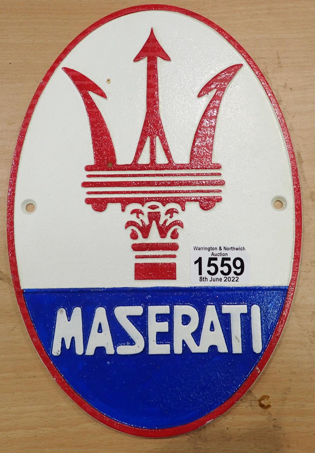 Cast iron Maserati wall plaque 20 x 30 cm. P&P Group 2 (£18+VAT for the first lot and £3+VAT for