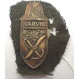WWII German Narvik Campaign Shield cut from a uniform. P&P Group 1 (£14+VAT for the first lot and £