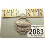 British WWII Royal Tank Regiment beret badge and a pair of brass shoulder titles. P&P Group 1 (£14+