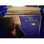 A box of LPs including Phil Collins and Buddy Holly. Not available for in-house P&P, contact Paul