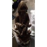 A cast statue of a Buddhist Deity. Not available for in-house P&P, contact Paul O'Hea at Mailboxes