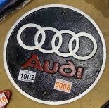 Cast iron circular Audi plaque, D: 18 cm. P&P Group 2 (£18+VAT for the first lot and £3+VAT for