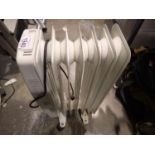 An oil filled radiator. Not available for in-house P&P, contact Paul O'Hea at Mailboxes on 01925
