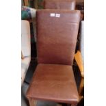 A pair of brown faux leather dining chairs. Not available for in-house P&P, contact Paul O'Hea at