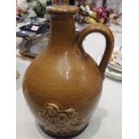 Doulton style stoneware flagon, H: 20 cm. Not available for in-house P&P, contact Paul O'Hea at