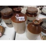 Four Pearsons brown glaze kitchen containers including two flagons. Not available for in-house P&