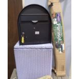 A wooden garden parasol, Lloyd Loom basket and a lockable letterbox. Not available for in-house P&P,