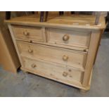 A pine two short over, two long chest of drawers. 90 x 50 x 75 cm, light surface scratches, no