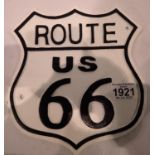 A Route 66 painted cast iron motoring sign. P&P Group 2 (£18+VAT for the first lot and £3+VAT for