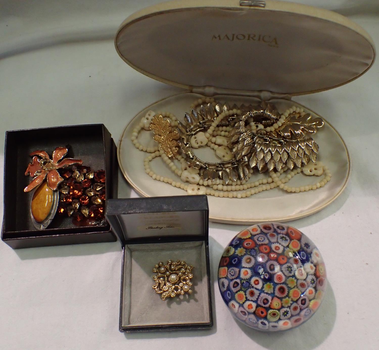 Small group of costume jewellery brooches and a vintage glass paperweight. P&P Group 1 (£14+VAT