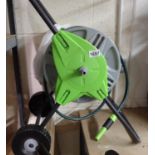 Garden hose on wheeled reel with attachments. Not available for in-house P&P, contact Paul O'Hea