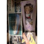 Regency porcelain boxed doll, a Nordkap billing boat and a Reel 45 remote control car. Not available