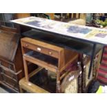 Black coffee table with a scene top, a side table with single drawer and a coffee table with glass