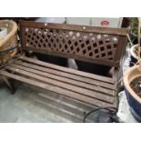 Teak and cast iron garden bench. Not available for in-house P&P, contact Paul O'Hea at Mailboxes