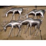 Four metal reindeer ornaments. Not available for in-house P&P, contact Paul O'Hea at Mailboxes on