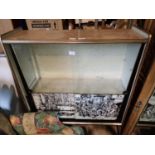 A pictorial glass frontal cocktail cabinet on metal supports. Not available for in-house P&P,