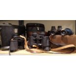 Eight pairs of binoculars, some cased. Not available for in-house P&P, contact Paul O'Hea at