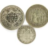 Three world silver coins, various grades. P&P Group 1 (£14+VAT for the first lot and £1+VAT for