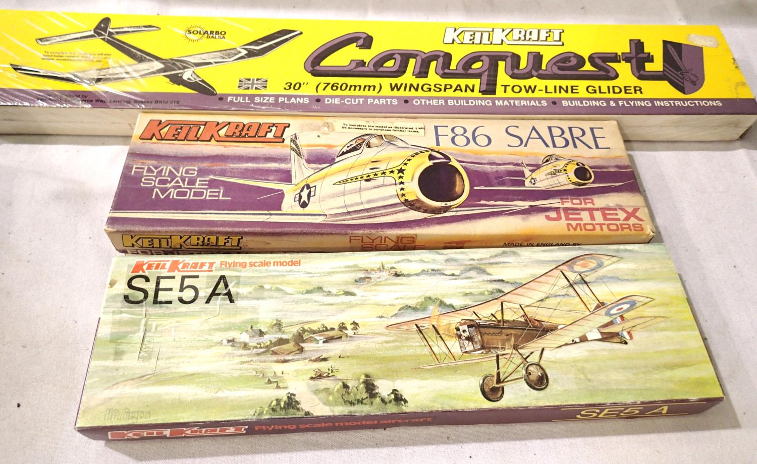 Three Keil Kraft Balsa flying aircraft kits Conquest Glider, factory sealed. Plus SE5A and F 86