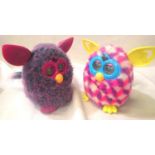 Two Furbys, battery operated, untested. P&P Group 1 (£14+VAT for the first lot and £1+VAT for