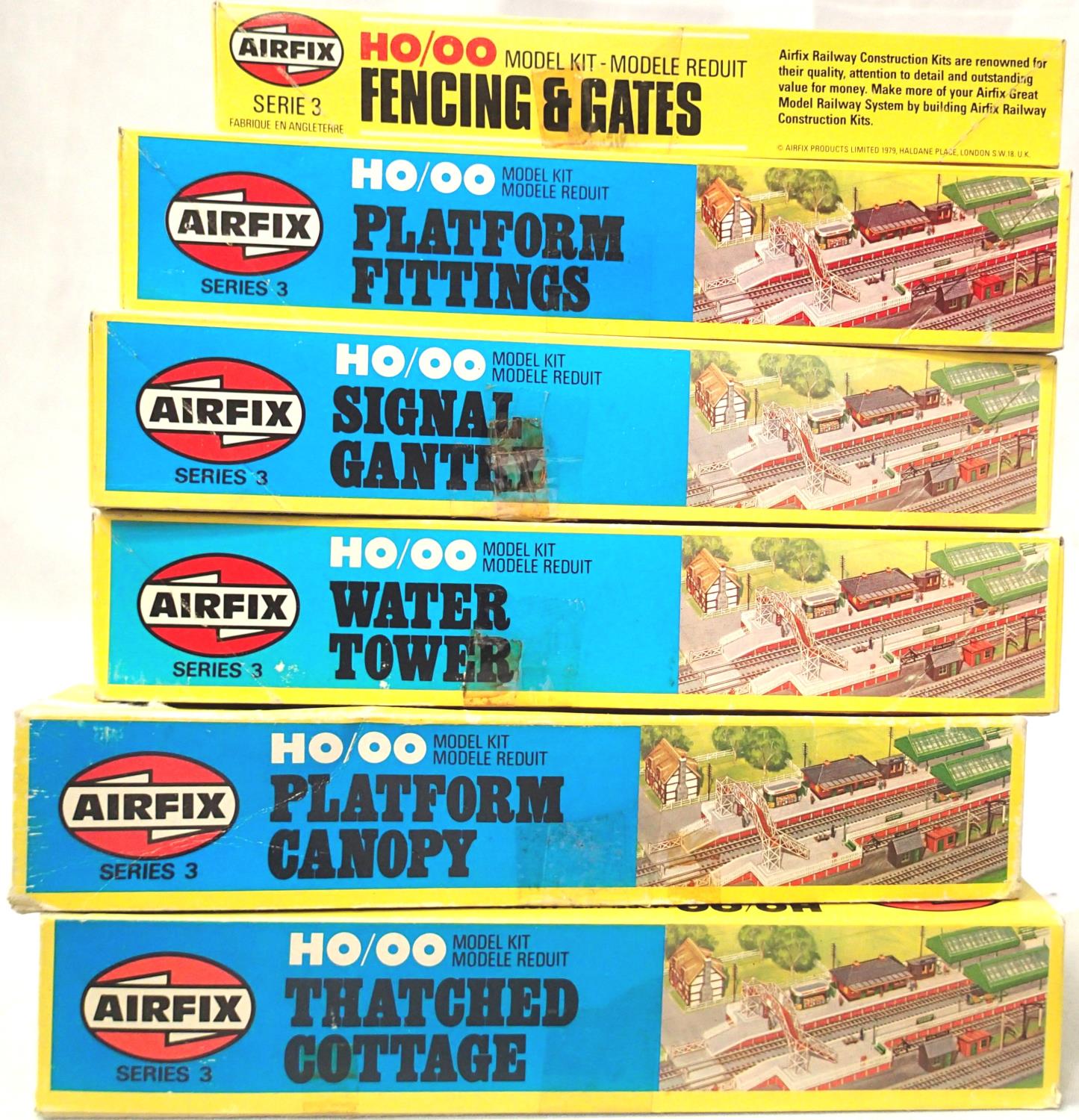 Six boxed Airfix OO scale railway related kits, fencing, fittings, signal gantry, water tower,