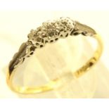 18ct gold and platinum ring set with small diamond chips, Size P, 1.9g. P&P Group 1 (£14+VAT for the