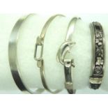 Three 925 silver bangles, combined 43g and a further white metal bangle. P&P Group 1 (£14+VAT for