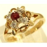 9ct gold ruby and CZ set ring, size K, 3.1g. P&P Group 1 (£14+VAT for the first lot and £1+VAT for