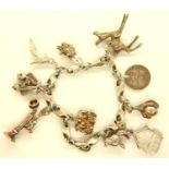 925 silver charm bracelet with ten charms, L: 15 cm, combined 42g. P&P Group 1 (£14+VAT for the