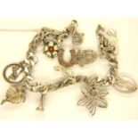 925 silver charm bracelet with ten charms, L: 20 cm, combined 35g. P&P Group 1 (£14+VAT for the