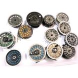 Four fly reels and eight spare spools, all with Dry Fly Line. P&P Group 3 (£25+VAT for the first lot
