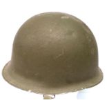 French M1952 steel helmet with chin strap, lacking liner (dented). P&P Group 3 (£25+VAT for the