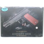 New and boxed airsoft hand gun. P&P Group 2 (£18+VAT for the first lot and £3+VAT for subsequent